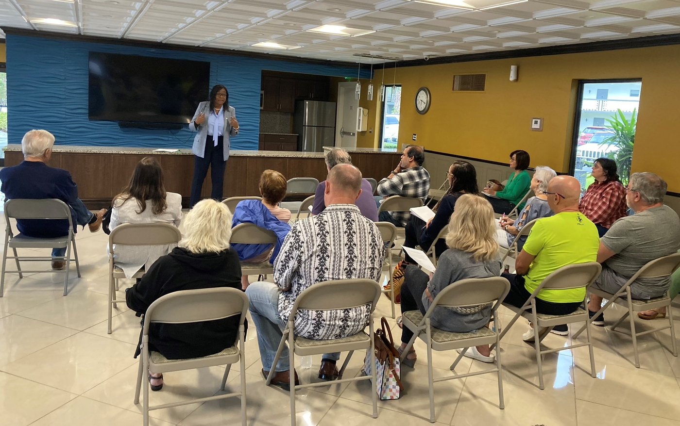 Marie Woodson speaking with residents at a Hillcrest community meeting